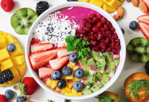 Mixed Tropical Fruit Salad with Superfood Boosts recipe image.